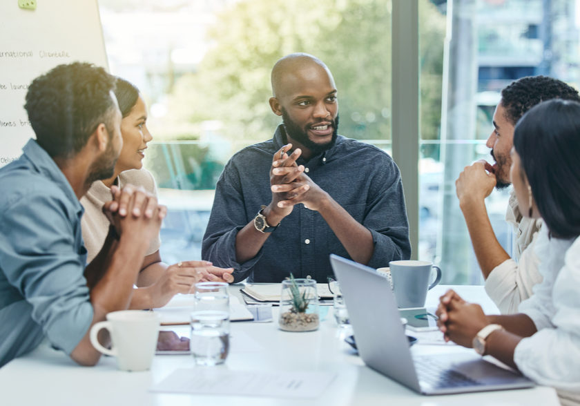 Youve done a great job so far. a group of colleagues in a business meeting